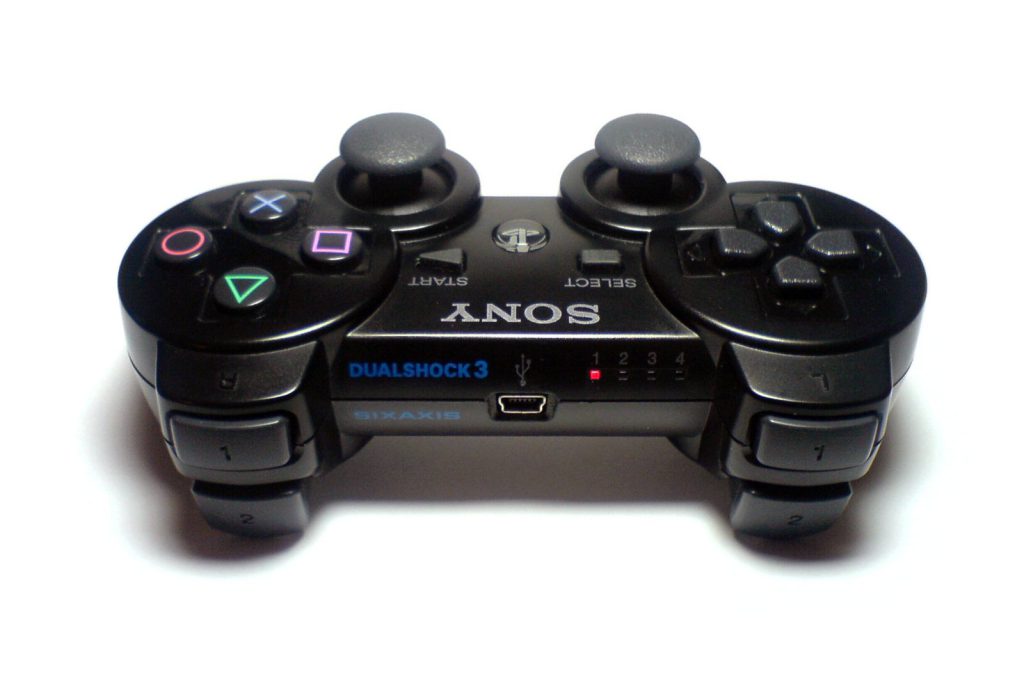 PS3 controller Mini-USB port and player LEDs used when pairing with Raspberry Pi